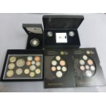 Four Royal Mint uncirculated coin sets to include; Emblems of Britain, 2011 year set, Icons of a