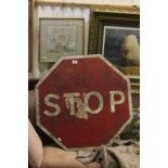 Old metal workmans STOP sign