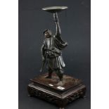 Bronze Samurai figure on ornate wooden base