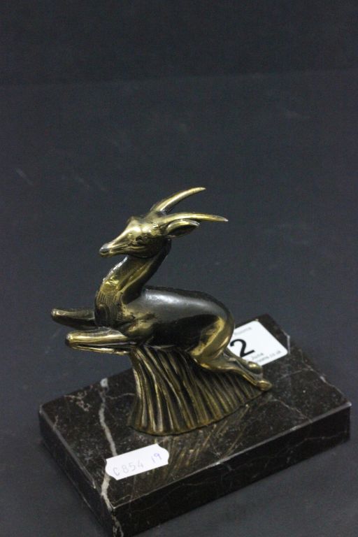 Art Deco Style Brass Paperweight in the form of a leaping deer on a marble base