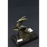 Art Deco Style Brass Paperweight in the form of a leaping deer on a marble base