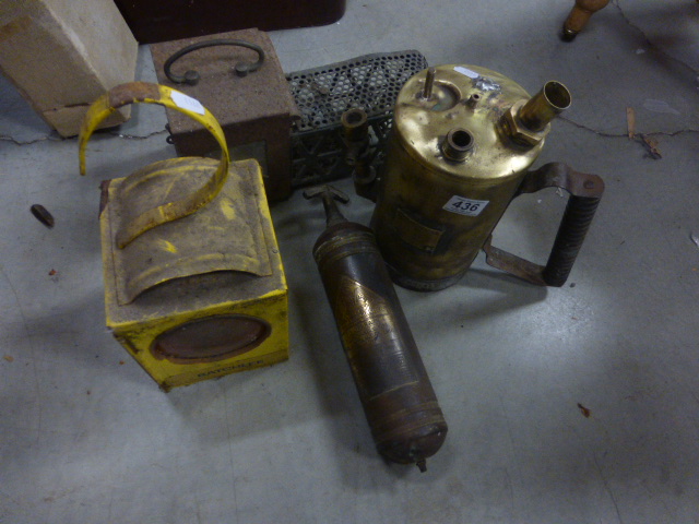 An industrial barograph,a workmans lamp ,a military blowtorch and a vintage fire extinguisher.