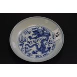 19th Century Guang Xu marked blue & white dish with dragon motif