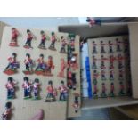 A large collection of 200+ loose diecast and plastic military figures, mostly handmade but some