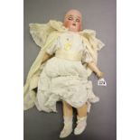 Gerbruden Kuhnlenz bisque headed jointed composition doll with teeth & sleeping brown eyes, marked