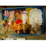 A large collection of approximately 50 dolls to include Barbie, Six Million Dollar Man etc, together