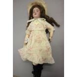 SFBJ bisque headed composition doll marked D 60 Paris 5 to back of neck, paint loss to hands,