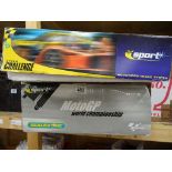 Two boxed Scalextric sets to include Scalextric Sport Moto GP World Championship with both bikes and