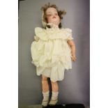 DRGM bisque headed composition doll marked DRGM 390 246/ 10 to back of head, sleeping blue eyes,