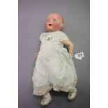 German bisque headed composition doll with blue sleeping eyes, marked 247-4 Germany to back of head,