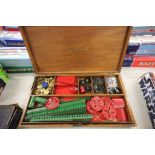 Case containing a collection of Meccano to include various colours and accessories