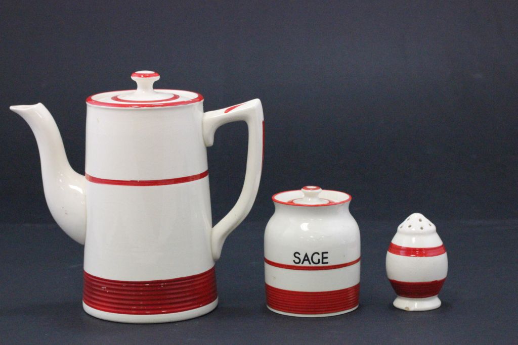 Collection of Kleen Kitchen Ware ceramics in red & white pattern to include; toast rack, teapot,