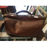 A vintage Gladstone style leather bag