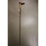 Walking stick with unusual knop being a creatures head & having faux ivory neck