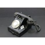 1940's black telephone with pull out tray