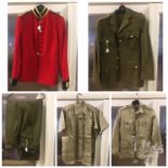 A military dress jacket one other jacket trousers and shirts .