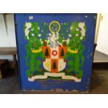 A large painted metal hanging pub sign