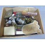 Box of collectables to include fishing reels, lighters. patch etc