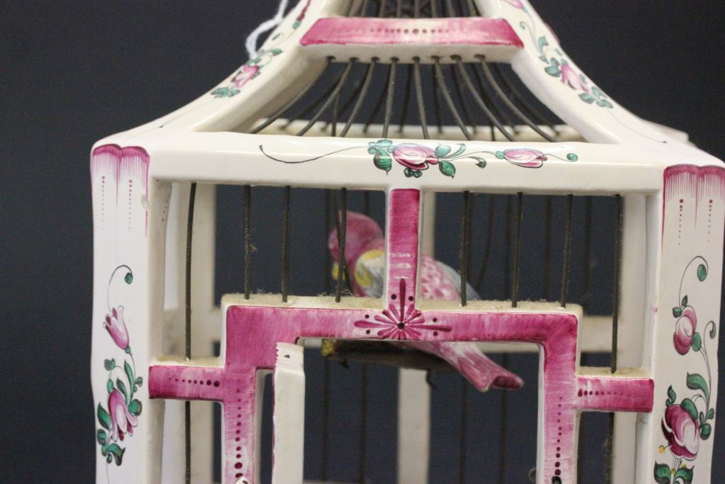 A interesting Faience bird cage with hand painted bird perched on a swing, with a detachable bird - Image 2 of 2