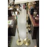 Two onyx and brass effect standard lamps