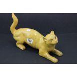 19C Yellow ground pottery cat with glass eyes
