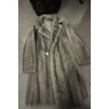 Grey fur coat possibly mink