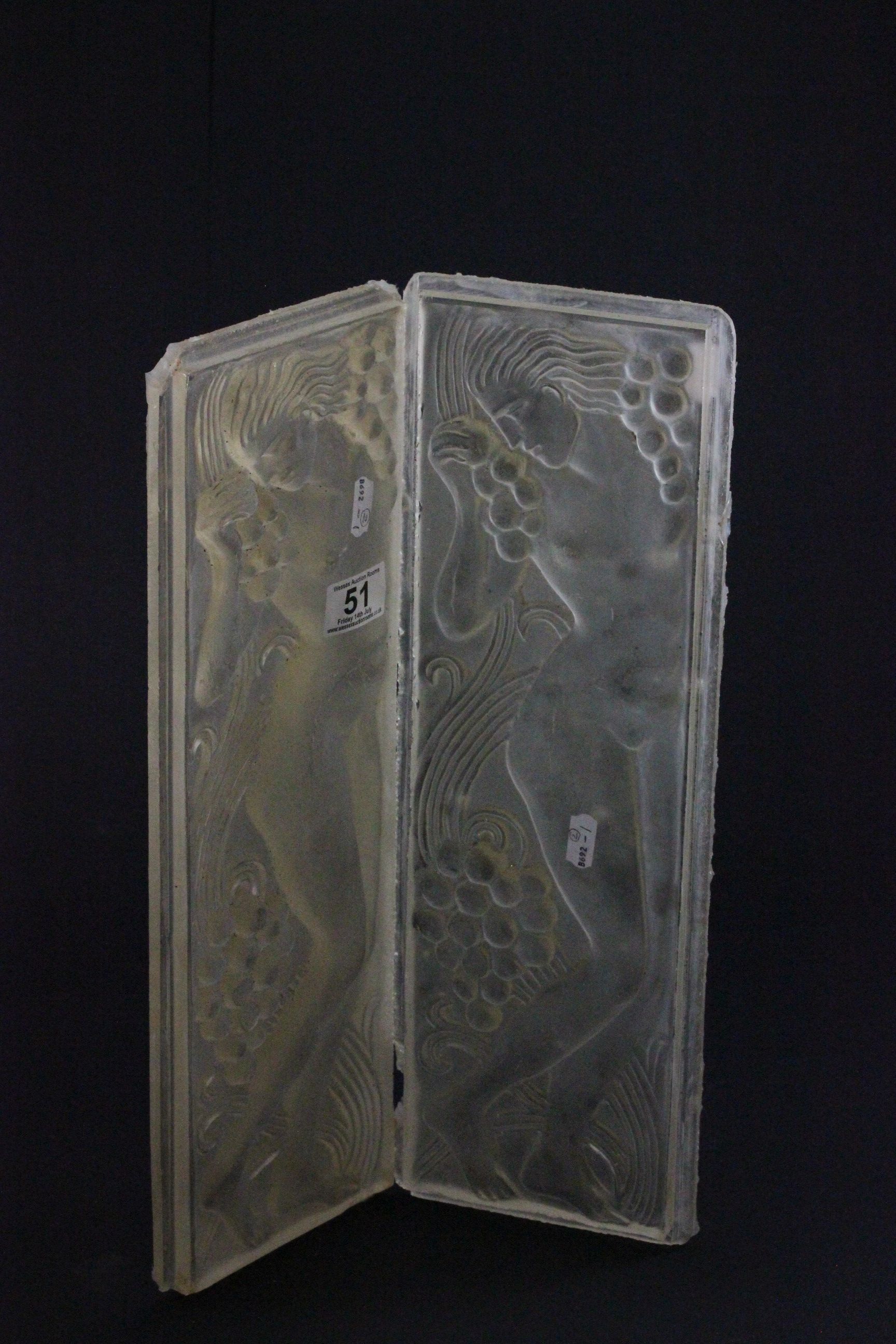 1930's pair of Art Deco molded plastic train interior panels depicting nude female with grapes