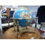 A large gemstone style table top globe.