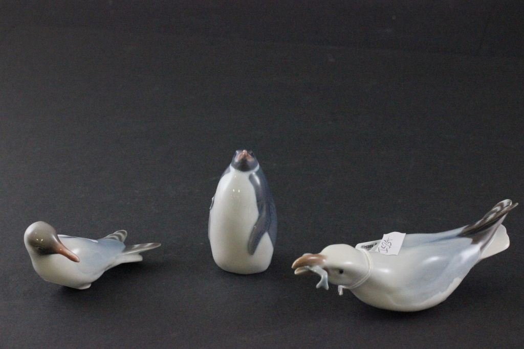 Three Royal Copenhagen Models of Seagull with fish 1128, Seagull 430 and Penguin 3005