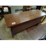 A mahogany plank box stool
