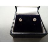 Pair of white gold diamond stud earrings of 53 points