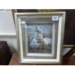 A contemporary framed erotic oil painting of a partially clad lady seated on a bed.