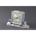 Art Deco French Chrome Cased Alarm Clock with Blue Plastic Shoulders, the square face marked Dep