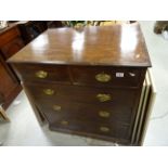 A 19th century mahogany chest of drawers two over three raised on a plinth base.