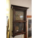 Early 20th century oak cased two train wall clock.