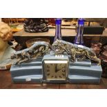 Art Deco ODYV Powder Blue Ceramic Clock surmounted by Silvered Panthers
