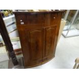 Large mahoganny two door above one single drawer corner cabinet