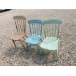 Two painted pine and one other stick back chairs