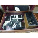 Suitcase containing Glass Slides and Vintage Kodak Tank Model B Camera