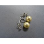 A pair of silver, cz and freshwater pearl earrings