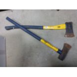 A wood splitting axe and one other.
