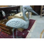 A bronze effect freestanding heron bird figure 75 cm tall.