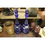 Pair of Blue Cut Glass Decanters, faceted yellow and clear glass vase and a Pair of red and clear