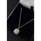 A silver and pave set cz pendant necklace, cased