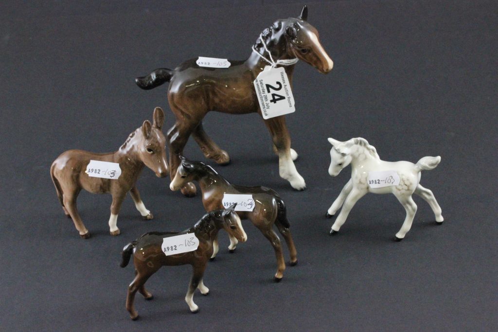 Four Beswick horses plus a donkey