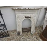 White painted early 20th century cast iron fire surround