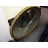 Large oval gilt framed mirror and a large picture frame