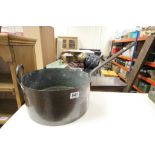 Large copper saucepan with iron handle