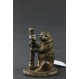 Bronze / brass match holder in the form of a dancing bear