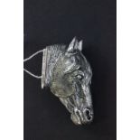 A silver plated vesta case in the shape of a horse head